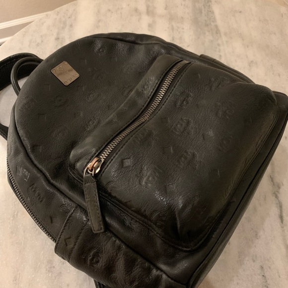 MCM | Bags | Authentic Mcm Embossed Black Calfskin Backpack  Authentic MCM embossed Black Calfskin backpack